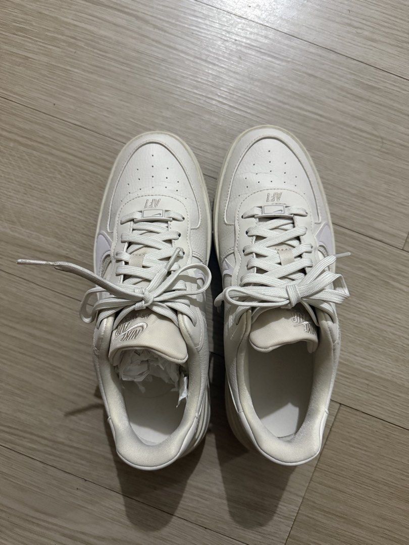 Nike Air Force 1 Women's Greige PLT. AF. ORM (Category: Sneakers) located in Pasig City. Submitted by rchsh (Listing ID 1462112427, Image 2). Description: - Nike Air Force 1 Platform Sneakers - Women's Size US 8 (EUR 39) - Color: Light Greige with subtle Lilac accents on the Swoosh - Platform sole for added height - Ideal for everyday wear - Selling as no longer needed.