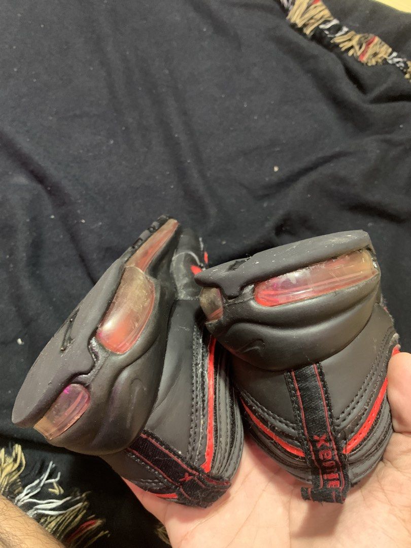 Nike Air Max 97 Black Red Men's US 9.5(Authenticated) (Category: Sneakers) located in Cagayan de Oro. Submitted by chabermz (Listing ID 1462225650, Image 3). Description: - Nike Air Max 97 - Color: Black with Red Accents - Size: US 9.5/ Euro 43 - Condition: Shows some signs of wear on soles and upper, but plenty of life left. - Ideal for: Casual wear.