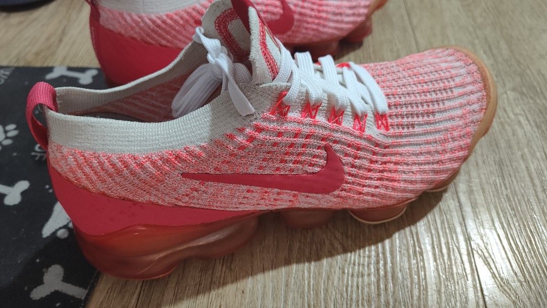 Nike Air VaporMax Flyknit 3 White Ember (Category: Sneakers) located in Manila. Submitted by lasampana50217 (Listing ID 1462117565, Image 2). Description: - Nike Air VaporMax Flyknit 3 size 8.5 womens - Color: Pink and White - Super comfortable and lightweight -No sole sep and air bubble is pristine. - Ideal for running or everyday wear - Features VaporMax air unit for excellent cushioning - White laces - Darker pink Nike swoosh - Reason for sell