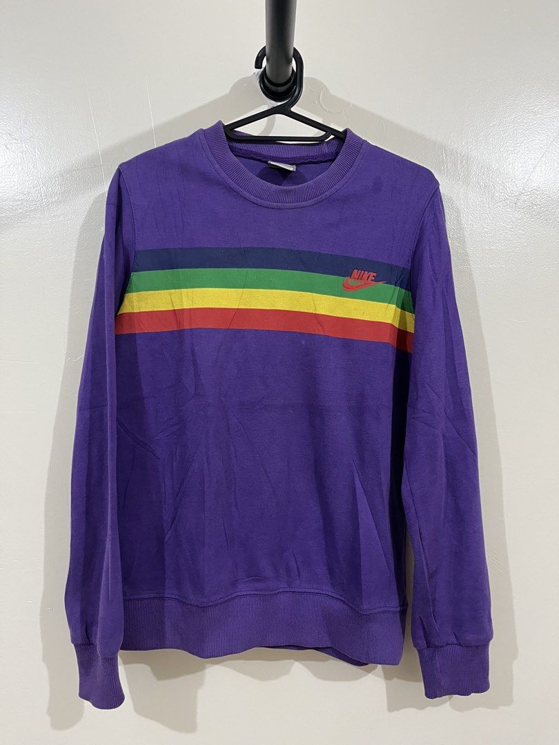 Nike Crewneck sweatshirt (Category: Coats, Jackets and Outerwear) located in Manila. Submitted by sophianne19 (Listing ID 1462110845, Image 1). Description: LEGIT RETRO VINTAGE PIECE / Y2K VIBES Price is negotiable ☺️ 🔥 Selling this authentic late-2000s Nike crewneck sweatshirt! Very unique purple colorway with iconic rainbow chest stripes (Navy, Green, Yellow, Red). Solid streetwear aesthetic, perfect for everyday retro look. 📌 QUICK DETAILS: 