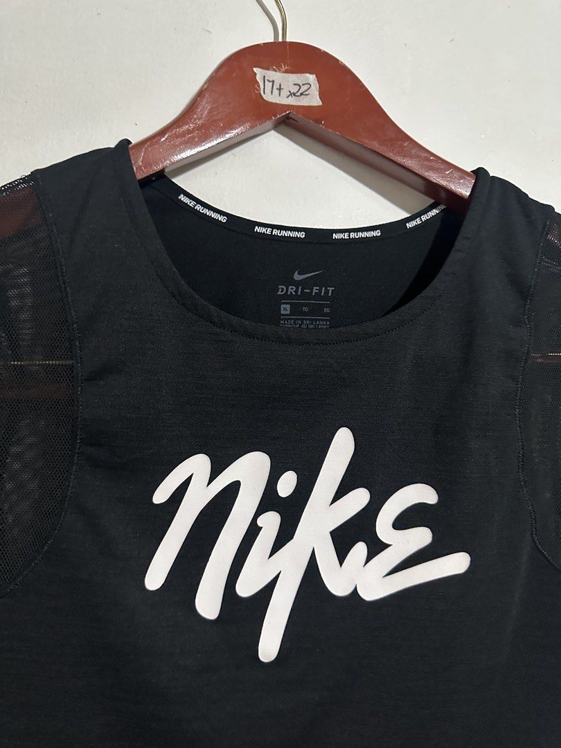 Nike Dri-FIT SS Runway short-sleeve (Category: Activewear) located in Quezon City. Submitted by jeconiah.tayuman (Listing ID 1462221782, Image 2). Description: Good as new no issues Xl on tag Stretchable Fit to S-L Depende sa Dimensions 17x22 Black Nike Dri-Fit running t-shirt - Size XL - Mesh sleeves for enhanced breathability - Classic Nike logo graphic on the front - Small Nike swoosh on the back - Made in Sri Lanka.
