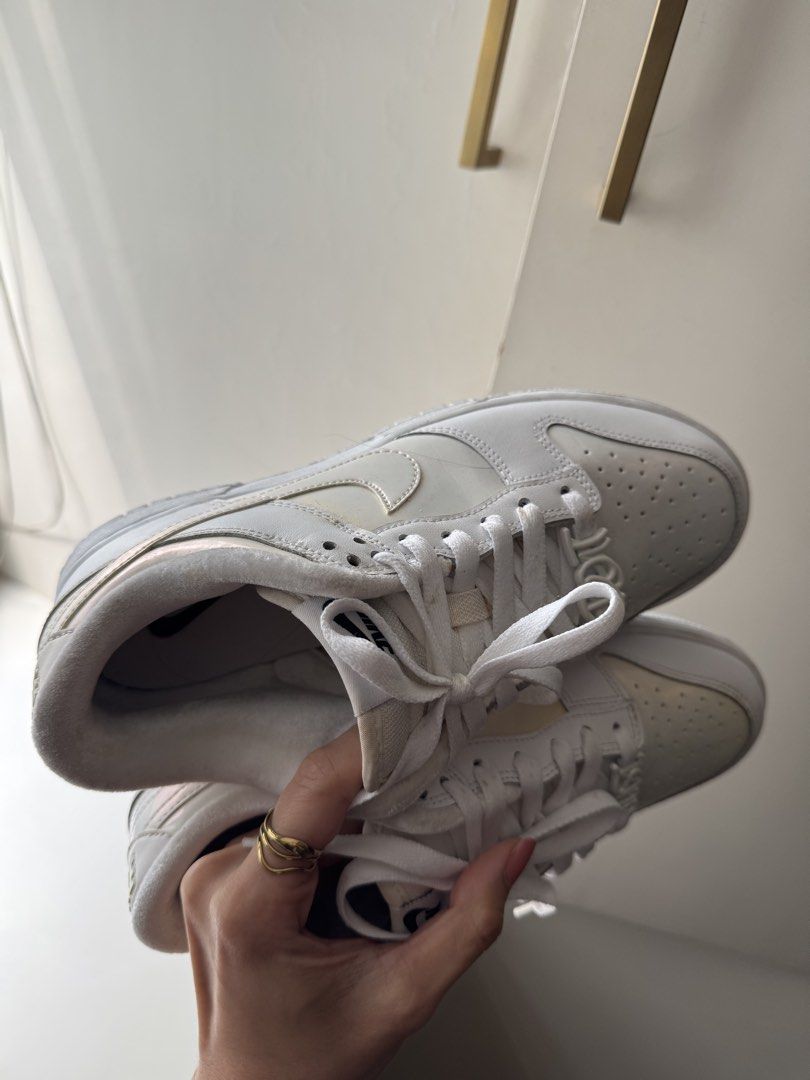 Nike Dunk Low (Category: Sneakers) located in Pasay City. Submitted by shop.stylestaple (Listing ID 1462048857, Image 2). Description: - Nike Dunk White Iridescent Sneakers - Subtle iridescent sheen on toe box and heel - Classic low-top silhouette - White laces - Great for everyday wear - no more box! - size 7.5wmns.