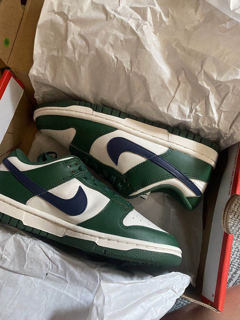 Nike Dunk Low Green White Navy (Category: Sneakers) located in Paranaque City. Submitted by maedizon (Listing ID 1462257067, Image 1). Description: - Classic Nike Dunks in Green, White, and Navy. - Iconic low-top silhouette. - Comes with original box and tissue paper. - Ideal for everyday wear. Rarely used .