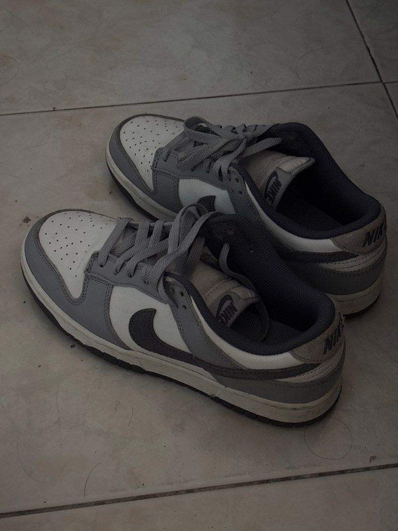 Nike Dunk Low Grey White (Category: Sneakers) located in Mabalacat. Submitted by red.deguzman (Listing ID 1462090036, Image 1). Description: - Classic Nike Dunks in grey and white. - Low-top silhouette. - Grey laces. - Nike logo on tongue and heel tab. - Versatile for everyday wear. - Minor scuffs on the sole..
