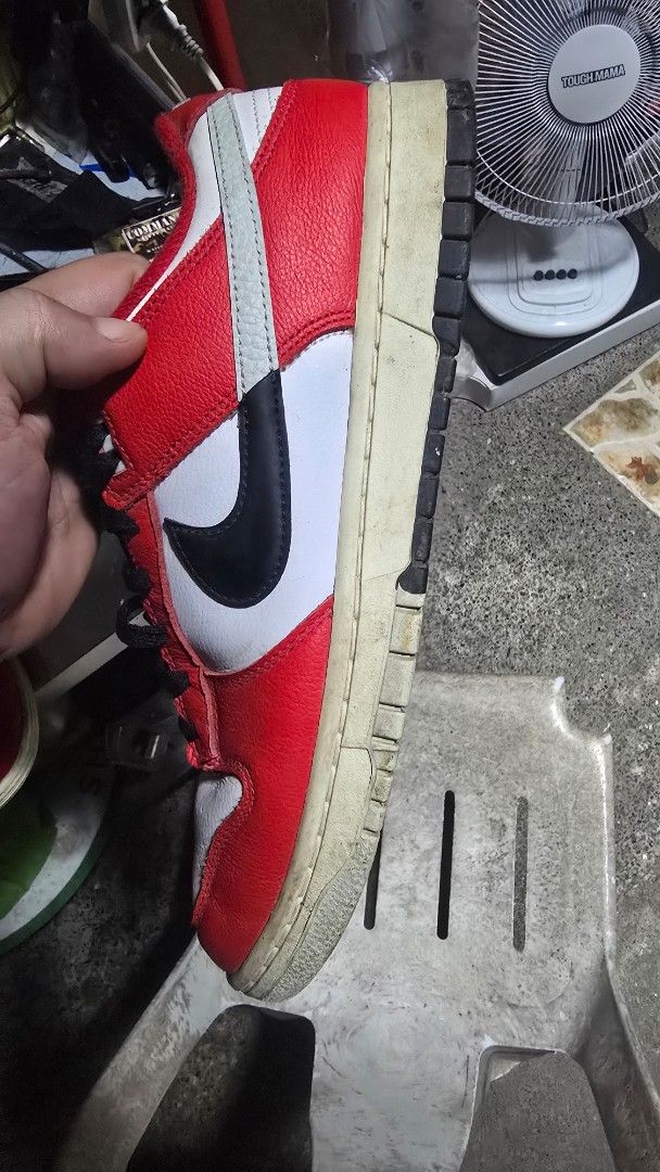 Nike Dunk Low Retro (Chicago Split) (Category: Sneakers) located in Quezon City. Submitted by andrewarr (Listing ID 1462261129, Image 2). Description: 💯Original - Classic Nike Dunks - Colorway: White, Red, Black - Silhouette: Low-top - Material: Leather upper - Features: Black laces, Black Swoosh - Sole: Cream midsole, Black outsole - Condition: Great for everyday wear - Size: 10 US Men.