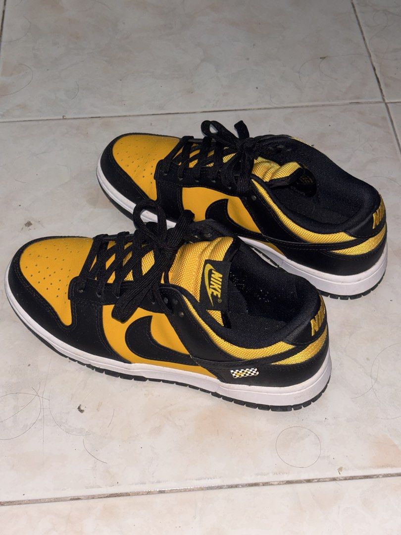 Nike Dunk Low "University Gold" Black Yellow (Category: Sneakers) located in Mabalacat. Submitted by red.deguzman (Listing ID 1462090259, Image 1). Description: - Nike Dunk Low - Colorway: University Gold and Black - Classic and versatile design - Ideal for everyday wear or sneaker collections - Please check photos for detailed condition.