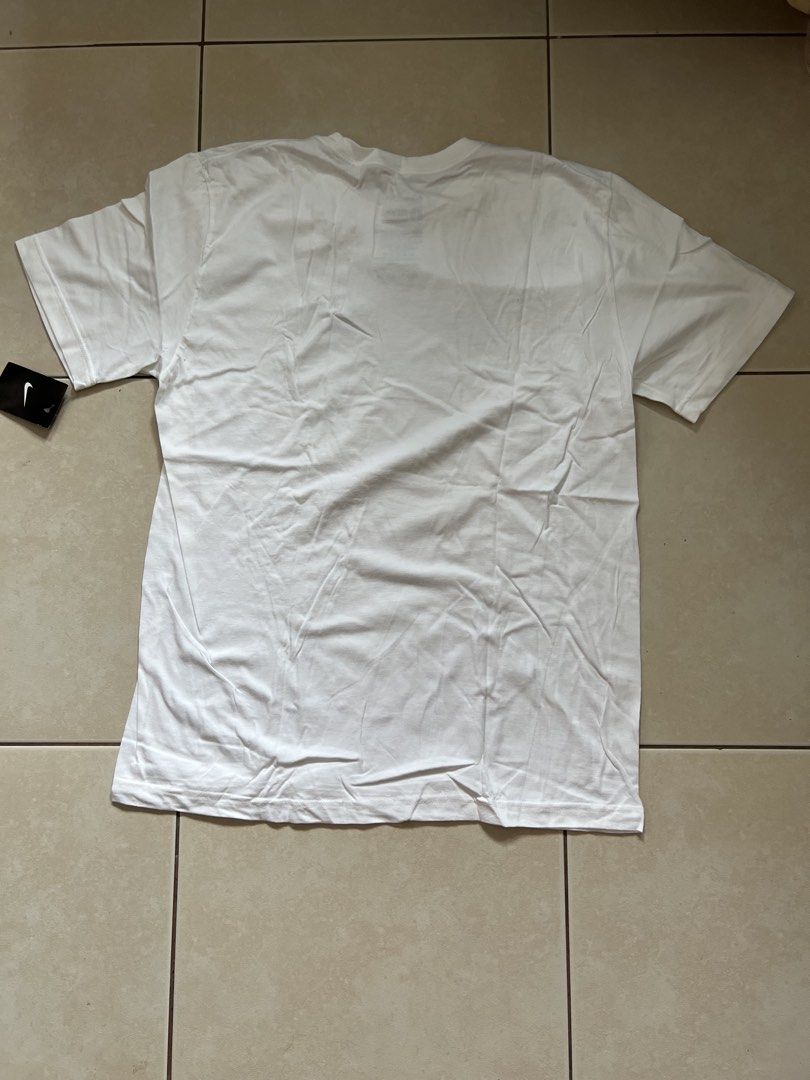 Nike EST 72 White T-Shirt Size L (Category: Tshirts & Polo Shirts ) located in Mandaluyong City. Submitted by luna_elisse (Listing ID 1462076489, Image 3). Description: - Brand: Nike - Color: White - Graphic Print: 'EST 72' with Swoosh - Material: 100% Cotton - Fit: Regular Fit - Size: Large - Origin: Made in Honduras - Condition: Brand new with original tags -Price:700+ sf -MOP: Gcash/BDO/GoTyme -Location: Mandaluyong -RFS: decluttering.