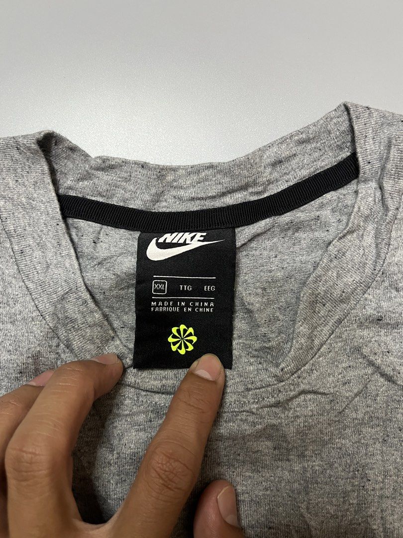 Nike Grey T-Shirt XXL (Category: Tshirts & Polo Shirts ) located in Manila. Submitted by jorgemabelin2001 (Listing ID 1462051244, Image 3). Description: - Grey Nike T-shirt - Size: XXL - Material: 100% Cotton - Features a small, colorful Nike logo on the chest - Ideal for casual wear -Dimes 24x29.