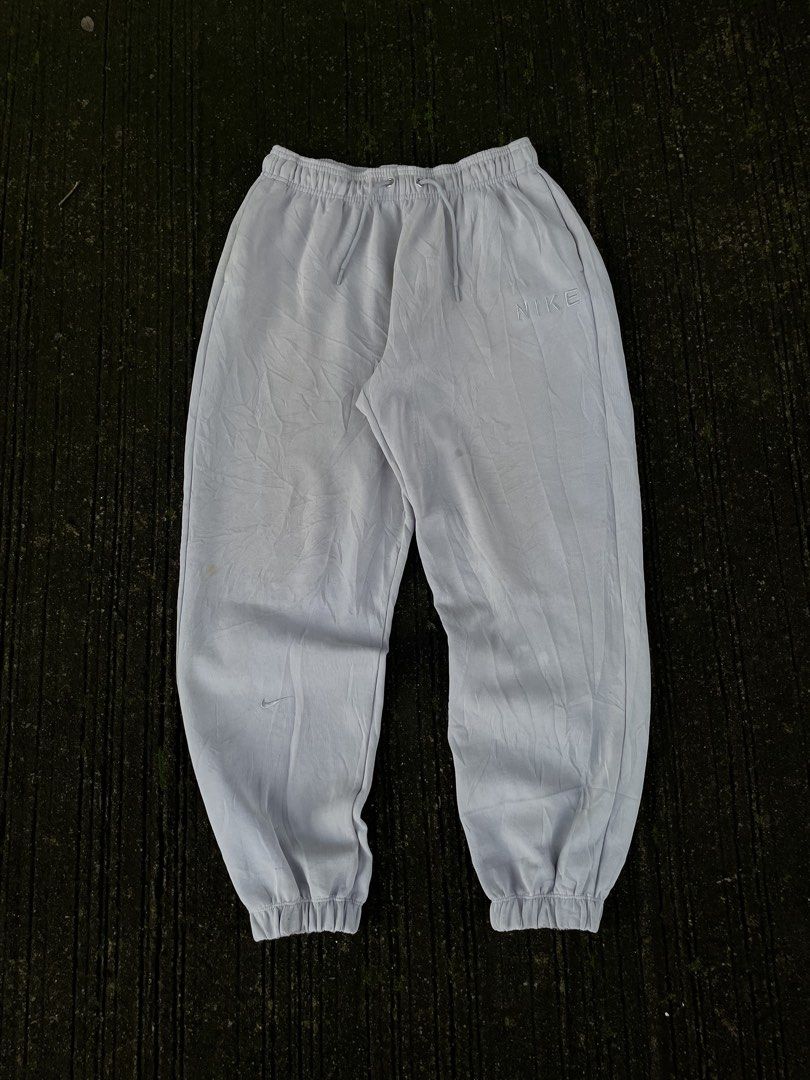 Nike Jogger (Category: Joggers) located in Manila. Submitted by arooold (Listing ID 1462047623, Image 1). Description: Nike Gray Jogger 26-30 W 38 L Complete Tag/Wash Tag Good Condition Minimal Hairline and Stain, need wash + sf.