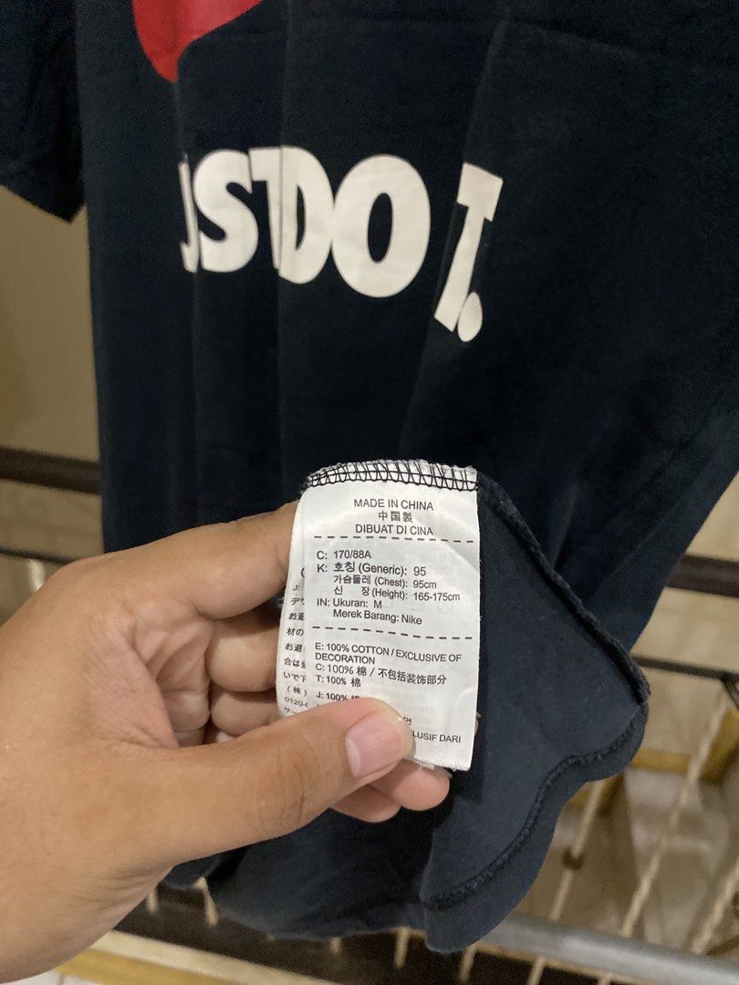 Nike Just Do It T-shirt (Category: Tshirts & Polo Shirts ) located in Rizal. Submitted by channzy (Listing ID 1462065255, Image 2). Description: - Authentic Black Nike T-shirt - Iconic 'Just Do It' graphic - Material: 100% Cotton - Size: Medium (M) - Fits Chest: 95cm - Recommended Height: 165-175cm - Ideal for everyday casual wear - Refer to label for complete care instructions.