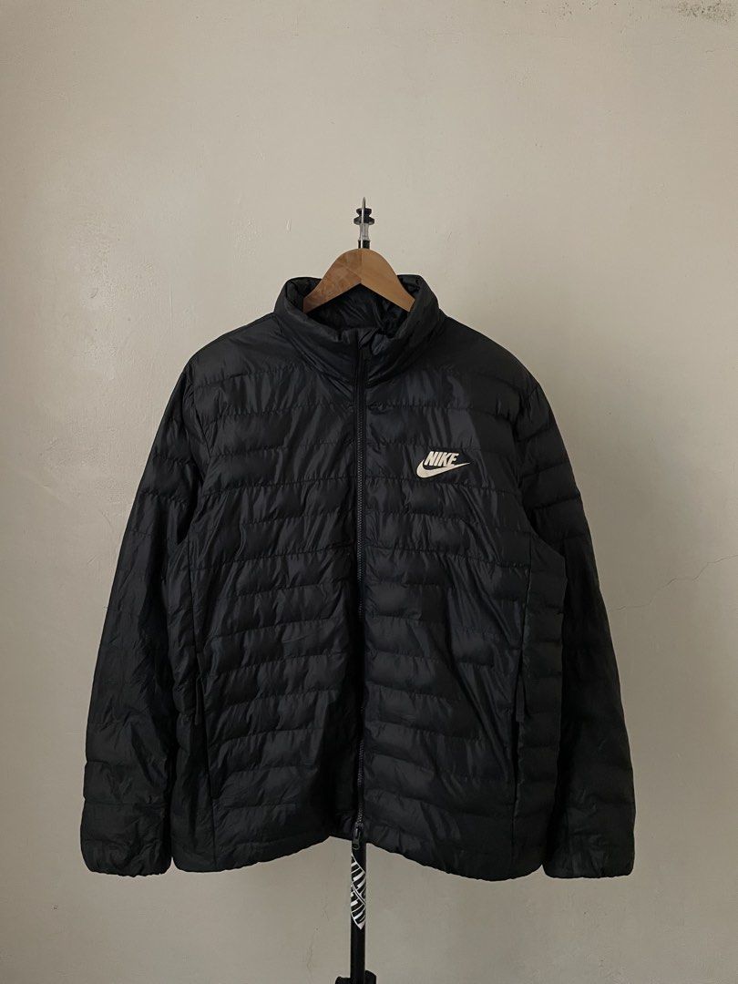 Nike Puffer Jacket (Category: Coats, Jackets and Outerwear) located in Marikina City. Submitted by stillnessliteral (Listing ID 1462035405, Image 2). Description: Nike Puffer Jacket size: XXL Dimension W 24.5 | L 28.5 | SL 26.5 color rate: 10/10 issue: two pinhole and very small unnoticeable ended stitch 🏷️ 1500 excellent overall condition dm for more info 📩.