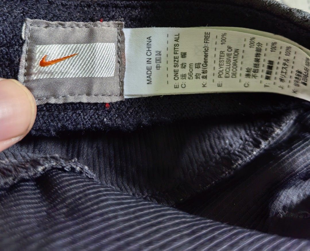Nike Running Cap (Category: Caps & Hats) located in Quezon. Submitted by miksxthrift (Listing ID 1462062427, Image 2). Description: - Black Nike cap - Ideal for running and sports - Lightweight material - Reflective strip on brim - Breathable mesh side panels - Adjustable strap at the back - Features Nike logo on the front.