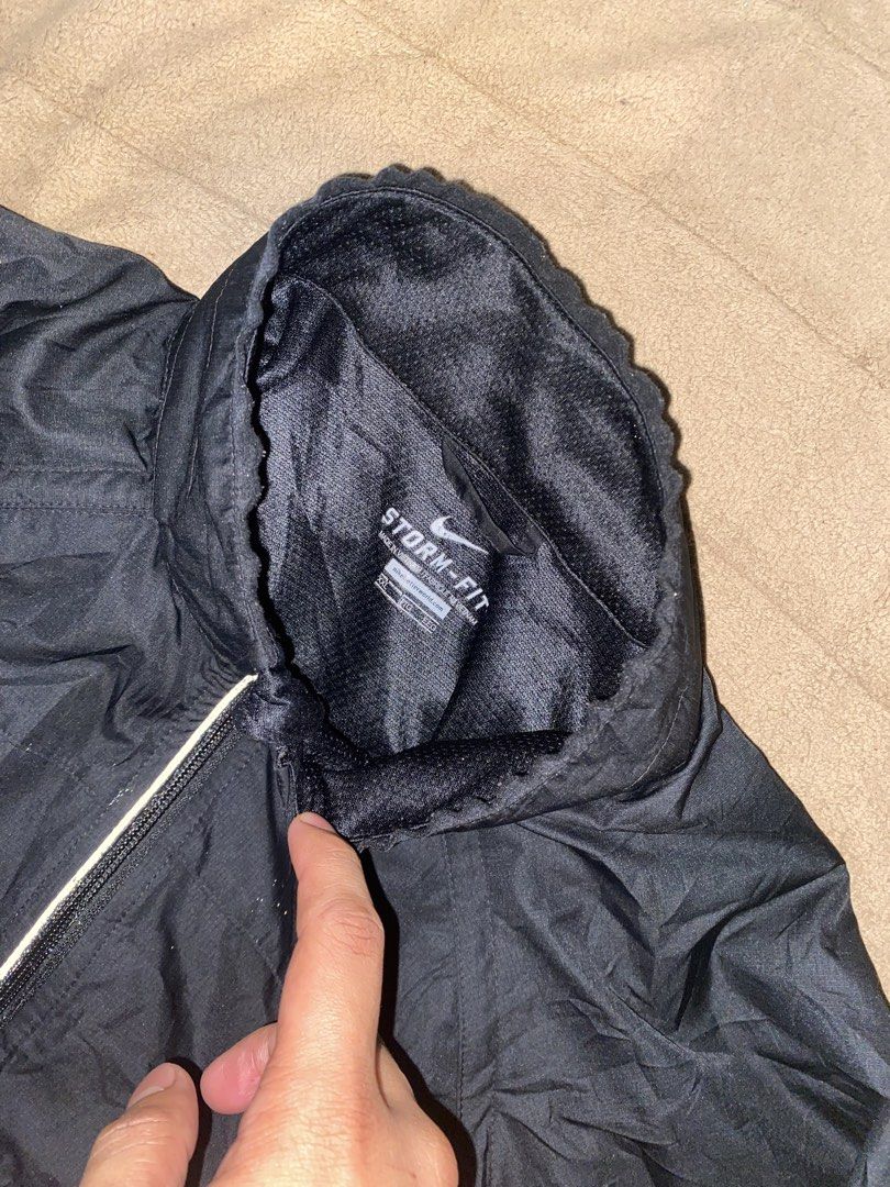 Nike Storm-Fit Black Full Zip Jacket XXL (Category: Coats, Jackets and Outerwear) located in Manila. Submitted by thriftfindnicarl (Listing ID 1462048771, Image 2). Description: - Black Nike Storm-Fit Jacket - Size XXL - Full zip closure - Convenient pockets - Breathable mesh lining - Ideal for outdoor activities - Made in Vietnam CAN REMOVE SLEEVE AND CAN BE VEST MINOR FLAWS.
