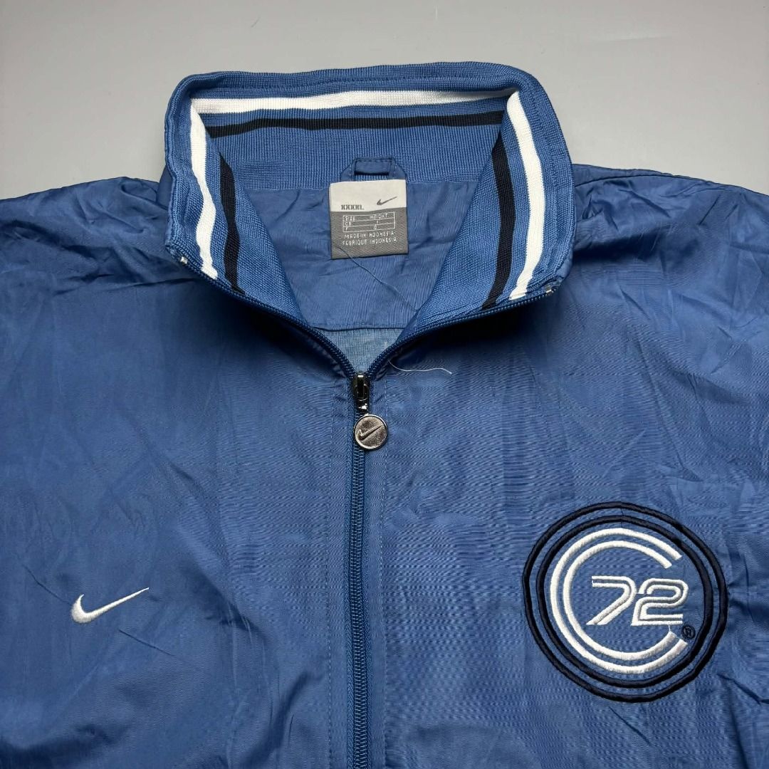 Nike Vintage '72 Track Jacket (Category: Coats, Jackets and Outerwear) located in Andop. Submitted by new.hanger (Listing ID 1462077612, Image 2). Description: 🔥 VINTAGE NIKE 72 TRACK JACKET 🔥 Clean vintage Nike 72 full-zip track jacket in blue & white. 💙🤍 Perfect for 90s / Y2K / old-school streetwear fits. • Brand: Nike • Size: XXXL • Measurements: 24 × 30 • Condition: Good vintage condition • Style: Full-Zip Track Jacket / Windbreaker • Det