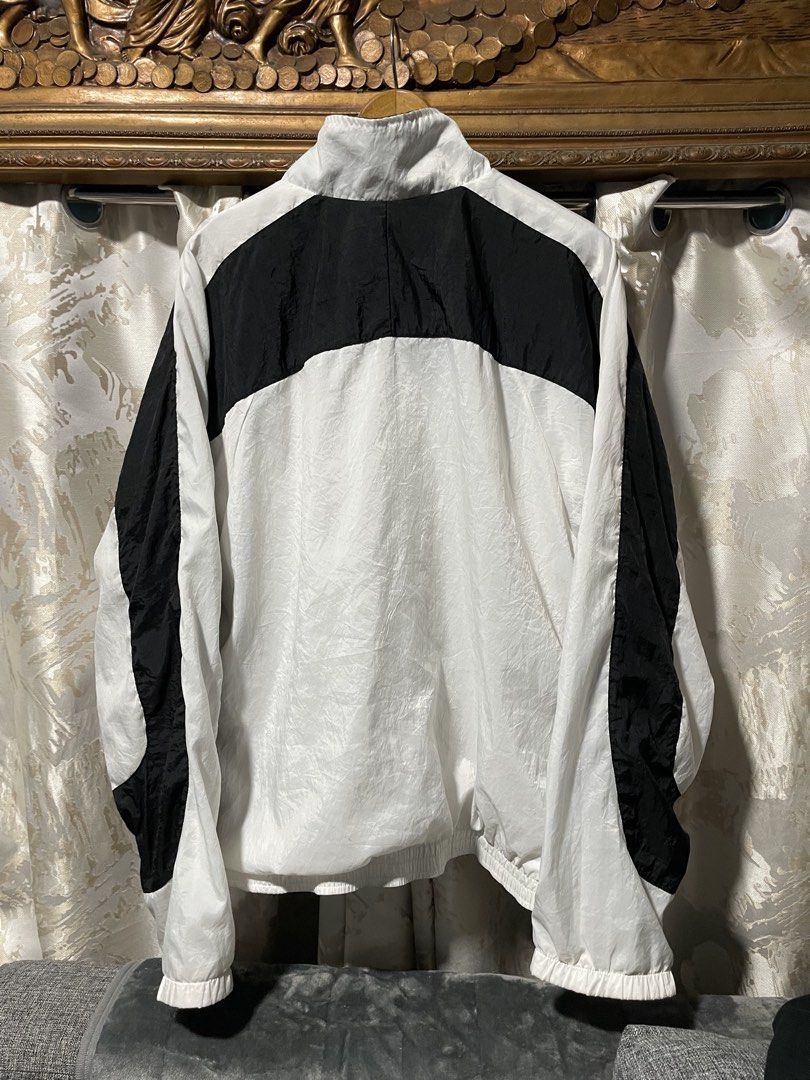 Nike Windbreaker Jacket Black White (Category: Coats, Jackets and Outerwear) located in Caloocan City. Submitted by thrift.enough (Listing ID 1462156493, Image 2). Description: - Classic Nike windbreaker jacket - Black and white colorway - Full zip closure - Elastic cuffs and hem - Ideal for everyday wear or sports - Made in Taiwan - Size L -28x28.