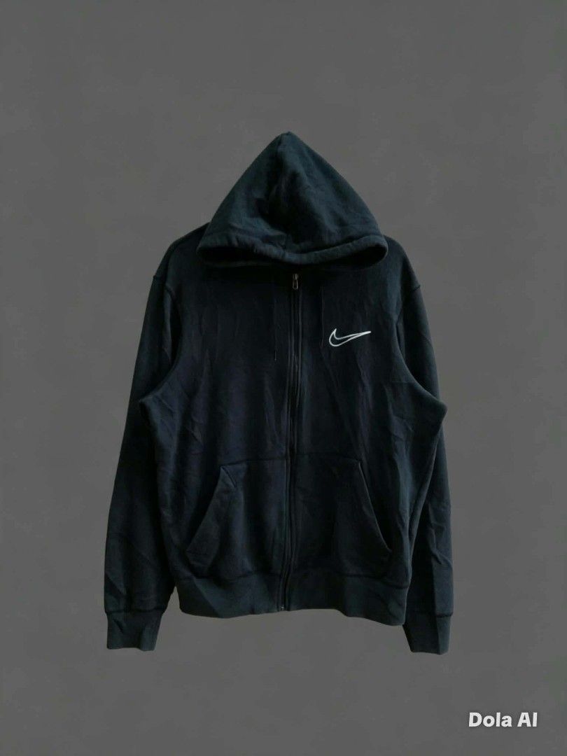 Nike Zip-Up Hoodie (Category: Coats, Jackets and Outerwear) located in Alegria. Submitted by happypenguin-d20d (Listing ID 1462079074, Image 1). Description: - Classic black Nike zip-up hoodie - Iconic embroidered Nike swoosh logo on chest - Two convenient front pockets - Comfortable and versatile for everyday wear - Great for layering.