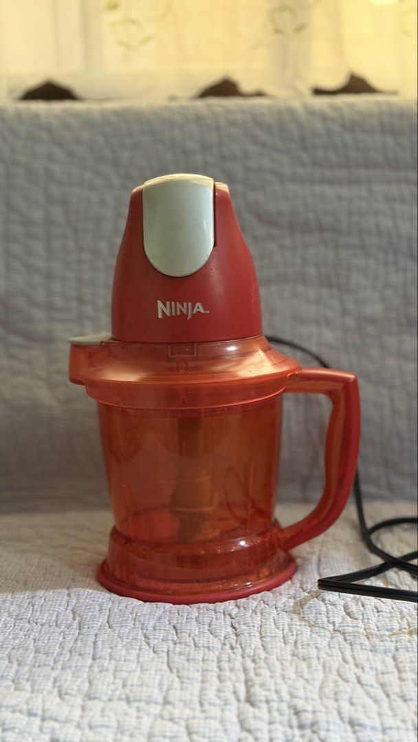 Ninja Food Processor Chopper Mini 120V (Category: Juicers, Blenders & Grinders) located in Quezon City. Submitted by amogz (Listing ID 1462086274, Image 2). Description: - Ninja Food Processor OB700QR - Ideal for chopping herbs, nuts, and vegetables - Includes: Main unit, chopper blade, and pitcher - Specifications: 120V, 400W - Ready to upgrade your kitchen!.