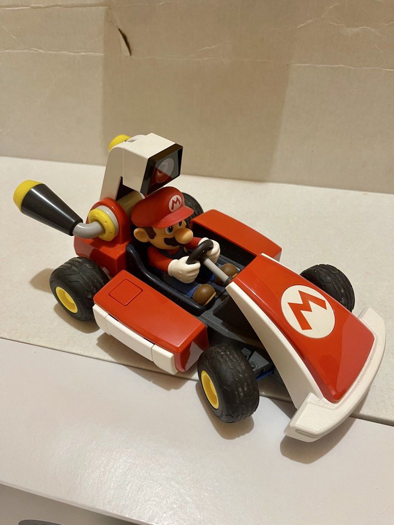 Nintendo Switch Mario Kart Live Home Circuit (Category: Nintendo) located in Caloocan City. Submitted by apolsevill80737 (Listing ID 1462107422, Image 3). Description: ‼️ Selling > MARIO KART HOME CIRCUIT for Nintendo Switch‼️🏎️ Signs of usage sa wheels, which is normal. Can be cleaned naman. - Experience Mario Kart in real life with Nintendo Switch! - Includes Mario Kart Live: Home Circuit game and RC Mario Kart. - Design your own race tracks u