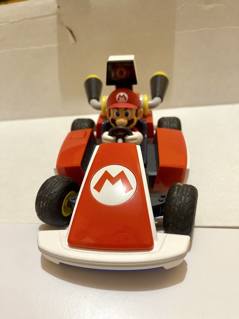 Nintendo Switch Mario Kart Live Home Circuit (Category: Nintendo) located in Caloocan City. Submitted by apolsevill80737 (Listing ID 1462107422, Image 2). Description: ‼️ Selling > MARIO KART HOME CIRCUIT for Nintendo Switch‼️🏎️ Signs of usage sa wheels, which is normal. Can be cleaned naman. - Experience Mario Kart in real life with Nintendo Switch! - Includes Mario Kart Live: Home Circuit game and RC Mario Kart. - Design your own race tracks u