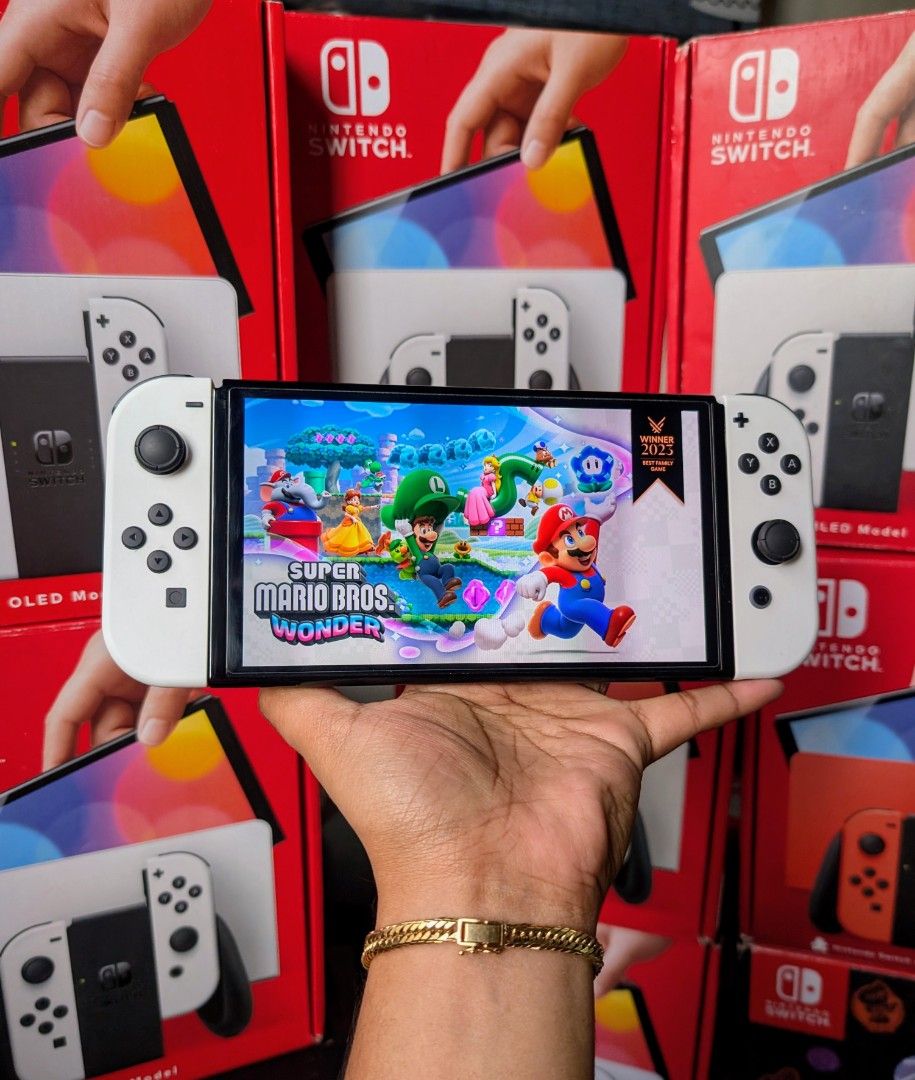 Nintendo Switch Oled with Games (Category: Nintendo) located in Manila. Submitted by nswitchgear (Listing ID 1462082696, Image 1). Description: 🎮 𝐅𝐎𝐑 𝐒𝐀𝐋𝐄: 𝐍𝐢𝐧𝐭𝐞𝐧𝐝𝐨 𝐒𝐰𝐢𝐭𝐜𝐡 𝐎𝐋𝐄𝐃 𝐌𝐨𝐝𝐞𝐥 with Free Games 🛒💰₱11,999 🎮Comes with 8 Accounts with Multiple Shared Game list that can be installed , no need to buy expensive games for mean time :) 📦 Complete Set: • Nintendo Switch OLED console • Dock • Joy-Con (L & R) • Joy-Co