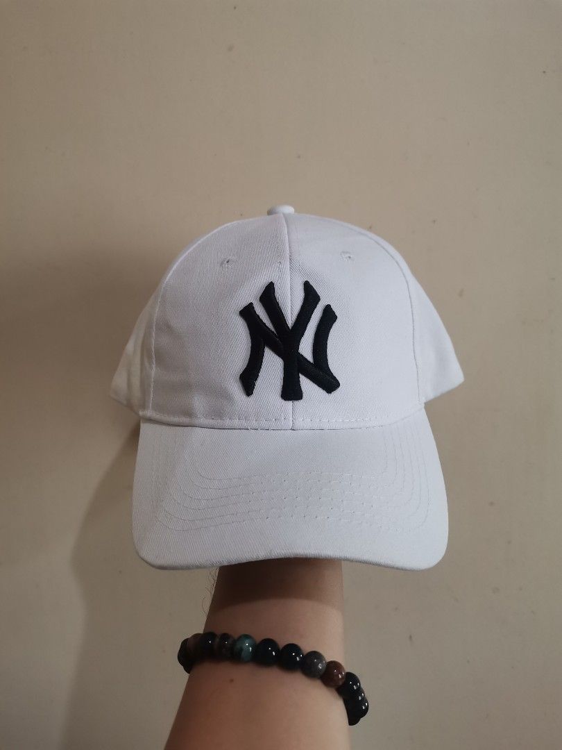 NY mlb hat (Category: Caps & Hats) located in Davao. Submitted by marcio17 (Listing ID 1462069770, Image 1). Description: Good condition Need reshaped and wash Issue : stains, deform brim pero d bali. 350 freeshipping only.