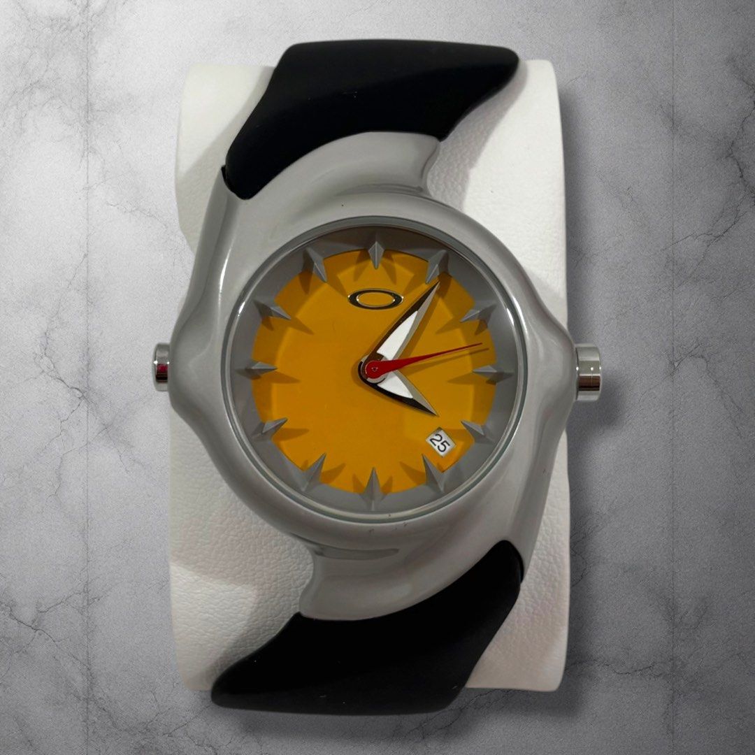 Oakley Blade Watch Yellow Dial (Category: Men's Watches) located in Cavite. Submitted by itsayaaa (Listing ID 1462093236, Image 1). Description: - Oakley Blade Watch - Striking Yellow Dial with Date Function - Durable Black Rubber Strap with Stainless Steel Buckle - Swiss Made Quality - Water Resistant up to 10 Bar - Scratch-Resistant Sapphire Crystal - Unique and Eye-Catching Design.