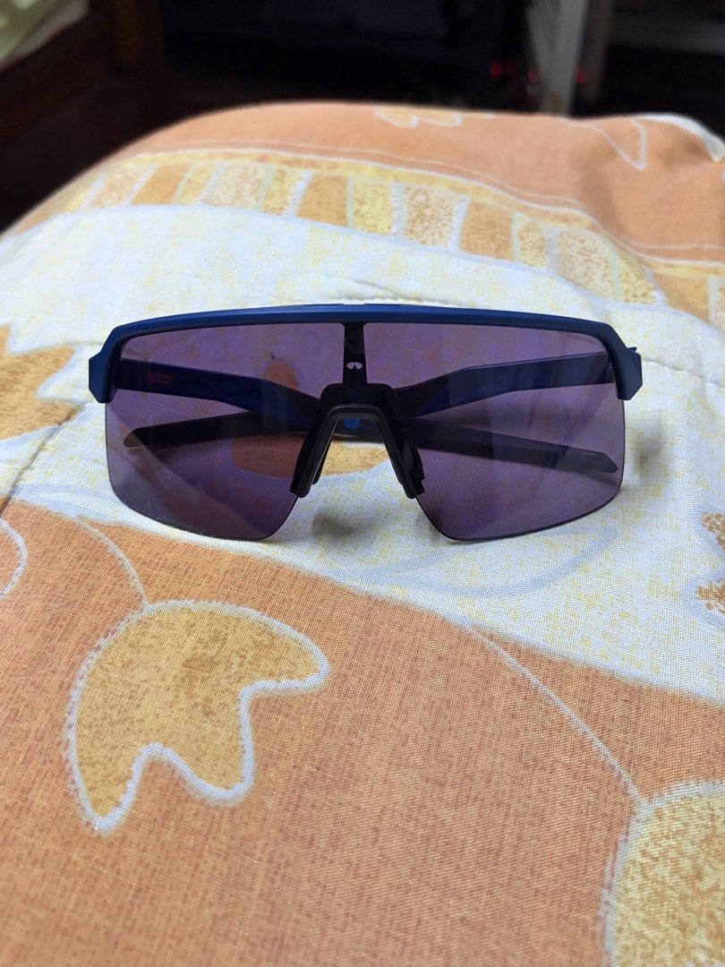 Oakley Sutro lite (Category: Sunglasses & Eyewear) located in Makati City. Submitted by chumamba (Listing ID 1462158814, Image 1). Description: Authentic Oakley Eyewear only Oakley Sutro - Matte Blue Frame - Purple Tinted Lenses - Sporty Wrap-Around Style - Ideal for Cycling and Running - Minor Scratches on edges m (still wearable) - Sold As Is.