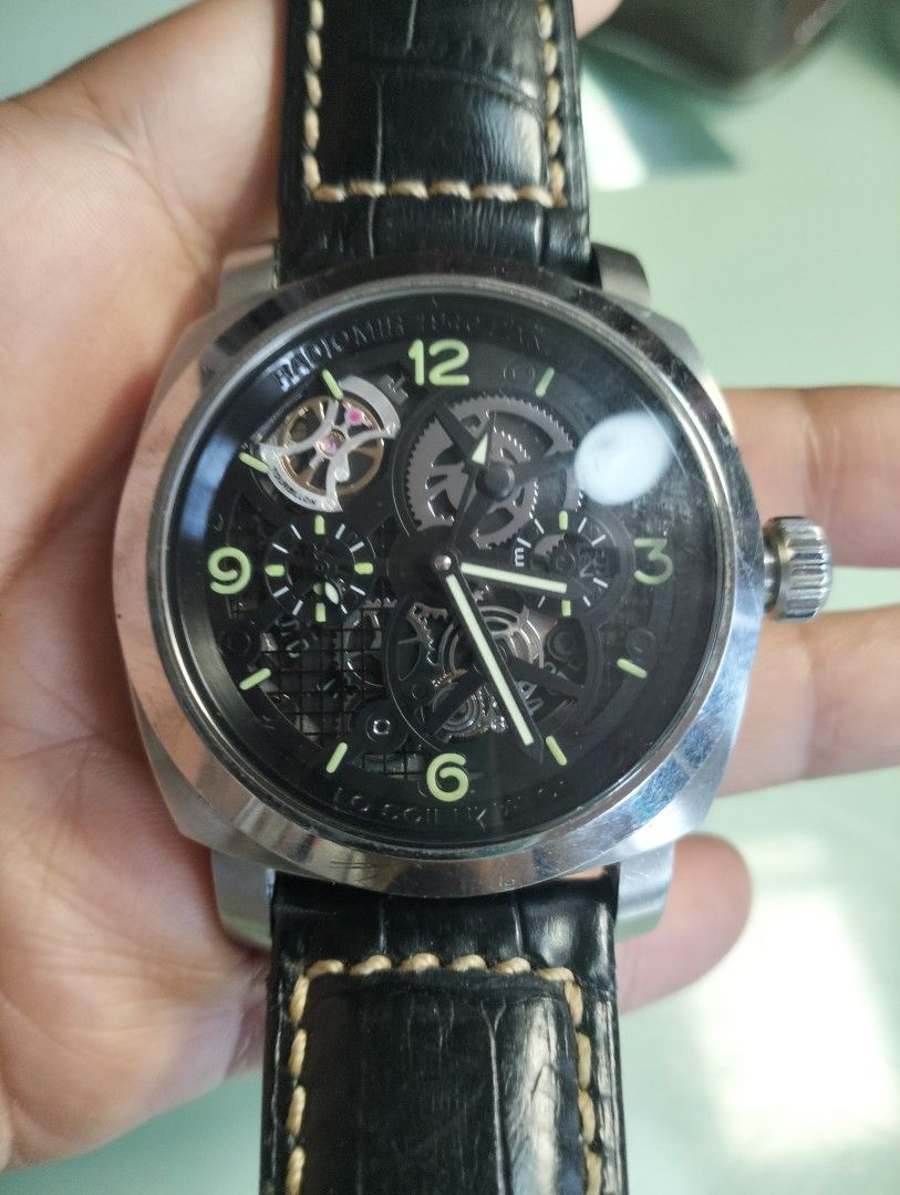 Officine Panerai Skeleton Automatic Watch (Category: Men's Watches) located in General Mariano Alvarez. Submitted by ma.miafajardo1219 (Listing ID 1462060297, Image 3). Description: Skeleton automatic watch from Officine Panerai. Black dial with luminous hands and markers. Black alligator strap with contrast stitching. Water resistant up to 50m. not working as is.