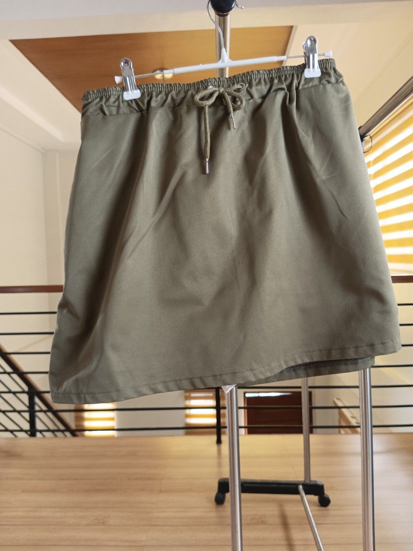 Olive green skirt (Category: Skirts) located in Manila. Submitted by yraeclub (Listing ID 1462074839, Image 2). Description: ♡ size: 30-34.