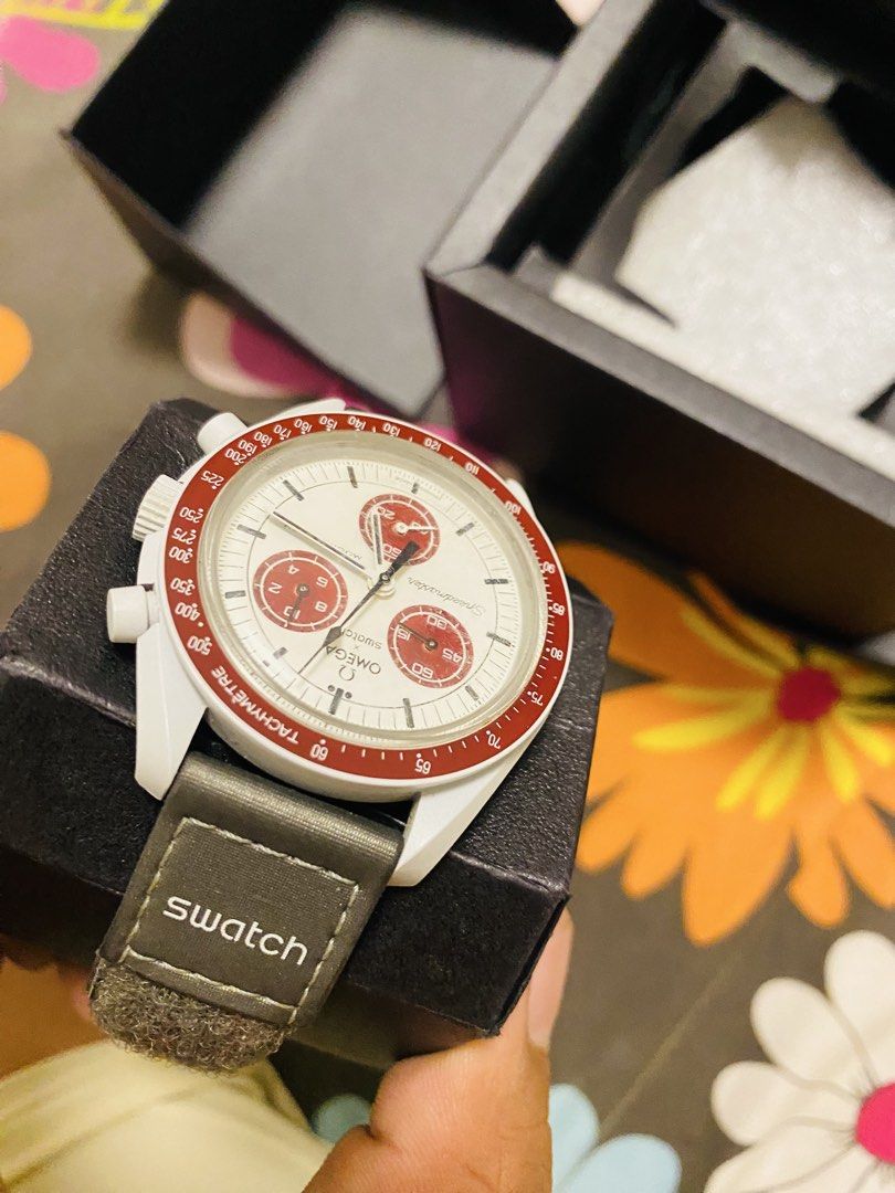 Omega x Swatch Speedmaster MoonSwatch Mission to Pluto (Category: Men's Watches) located in Zamboanga. Submitted by outfitdepot (Listing ID 1462177669, Image 3). Description: - Omega x Swatch Speedmaster MoonSwatch Mission to Pluto - Includes original box and papers - Purchase date: October 21, 2022 - Condition: Great, well-maintained - Ready for its new owner! ISSUE: pundi na ang battery.