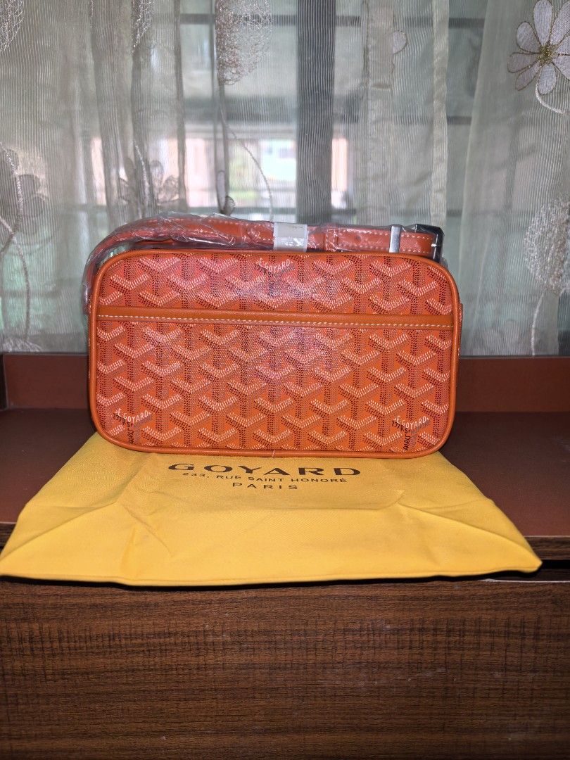 Orange Monogram Crossbody Bag (Category: Cross-body Bags) located in Manila. Submitted by mysticfox.9b1678 (Listing ID 1462047839, Image 1). Description: - crossbody bag - Classic monogram pattern - Secure zipper closure - Bright yellow interior - Comes with Goyard Paris dust bag.