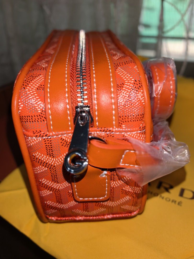 Orange Monogram Crossbody Bag (Category: Cross-body Bags) located in Manila. Submitted by mysticfox.9b1678 (Listing ID 1462047839, Image 2). Description: - crossbody bag - Classic monogram pattern - Secure zipper closure - Bright yellow interior - Comes with Goyard Paris dust bag.