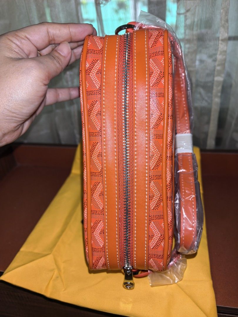 Orange Monogram Crossbody Bag (Category: Cross-body Bags) located in Manila. Submitted by mysticfox.9b1678 (Listing ID 1462047839, Image 3). Description: - crossbody bag - Classic monogram pattern - Secure zipper closure - Bright yellow interior - Comes with Goyard Paris dust bag.