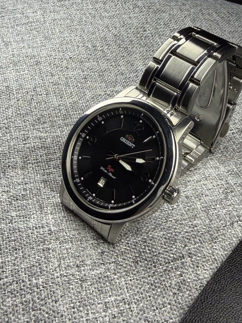 Orient SP Sporty Quartz (Category: Men's Watches) located in Bacoor. Submitted by offtheclock (Listing ID 1462098948, Image 1). Description: Orient SP Sporty Quartz Condition: Pre-owned Reference No: FUNF1005B0 Movement: Quartz (UNF1) Material: 316L Stainless Steel Case Diameter: 42mm (Hardlex Mineral Crystal) Dial: Matte Black Finish Strap: Original Stainless Steel Bracelet Inclusion: Replacement Box Price: ₱3,990 only *Pre-owned watches may nat