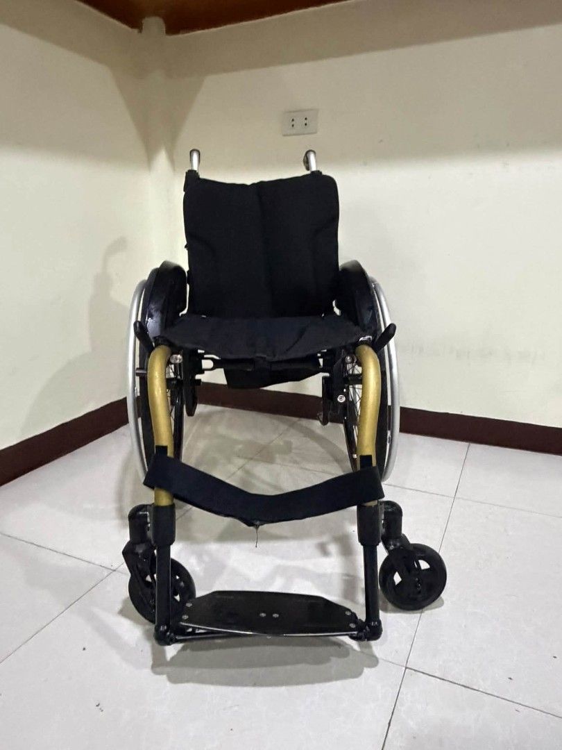 Ottobock Lightweight Folding Wheelchair (Category: Wheelchairs) located in Manila. Submitted by bravestorm.7b3e5f (Listing ID 1462110084, Image 1). Description: - Lightweight and folding Ottobock wheelchair - Easy to transport and store - Comfortable black fabric seat - Large rear wheels for smooth mobility - Smaller front casters for maneuverability - Includes a safety seatbelt - Ideal for mobility assistance.