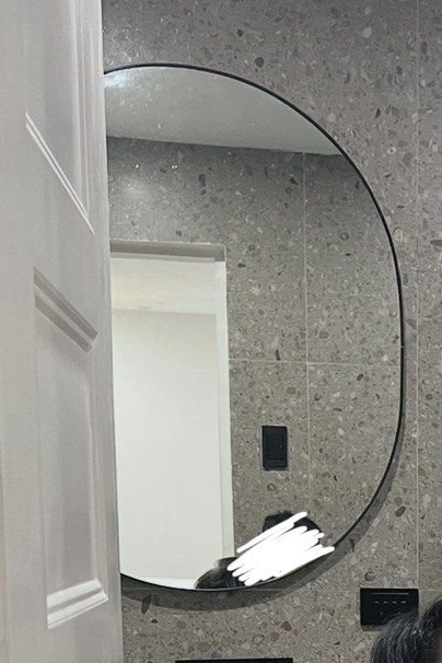 Oval Mirror with Black Frame by Style Maria (Category: Mirrors) located in Quezon City. Submitted by eicadh (Listing ID 1462110332, Image 2). Description: - Unique oval mirror shape - Sleek, thin black frame - Modern and stylish design - Ideal for bathrooms or entryways - Perfect size for checking outfits - Easy to hang on the wall.