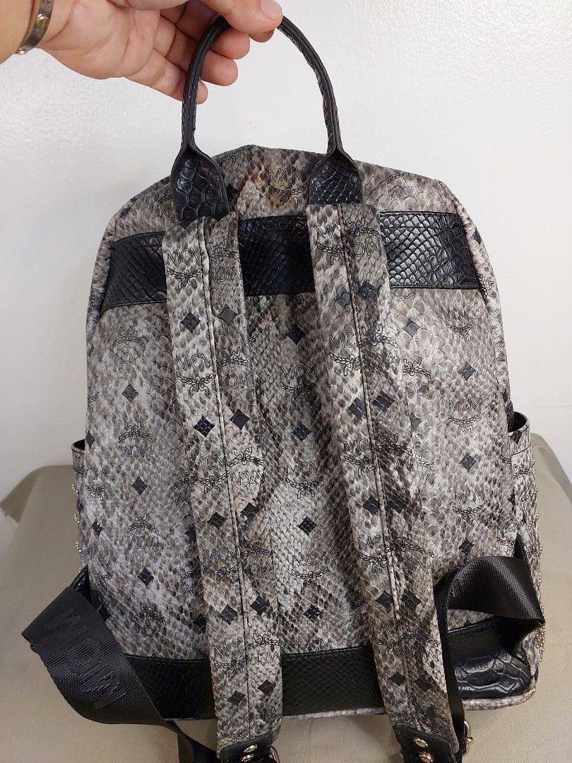 P1,500 only # 2695 - MCM München Python Canvas Stud Armour Backpack (Category: Backpacks) located in Cagayan de Oro. Submitted by jocelynt483 (Listing ID 1462118410, Image 2). Description: P1,500 only # 2695 - MCM München Python Canvas Stud Armour Backpack.