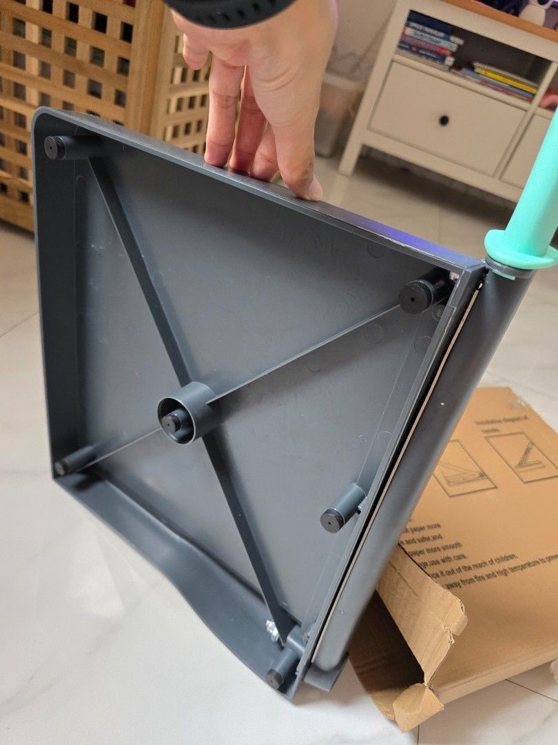 Paper Trimmer Guillotine with Ruler (Category: Craft Supplies & Tools) located in Taguig. Submitted by thriftzzzy (Listing ID 1462096141, Image 2). Description: - Grey paper trimmer with a light blue handle. - Built-in ruler marked in inches and centimeters. - Grid lines on the cutting surface for precise alignment. - Sturdy base with non-slip feet for stability. - Ideal for crafting, scrapbooking, and office tasks. - Delivers clean, precise cuts