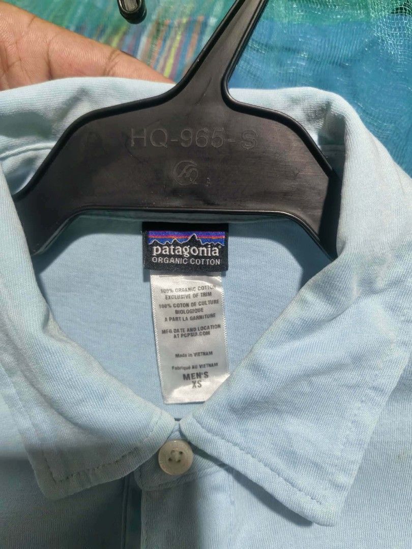 Patagonia polo shirt (Category: Activewear) located in Daet. Submitted by thriftnidiegz (Listing ID 1462190921, Image 3). Description: very good condition no stain L-27 W-19.5 may discoloration s neck see last photo.