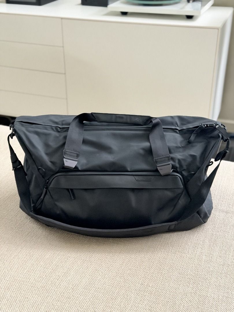 Peak Design Travel Duffel 35L Black (Category: Sling Bags) located in Paranaque City. Submitted by lorenzodlcruz (Listing ID 1462084740, Image 2). Description: Used twice, Like new. - Peak Design Duffel Bag - 35L Capacity - Ideal for weekend trips or gym - Multiple carry options (handles or shoulder strap) - Front zip pocket for easy access - Durable material - Clean, minimalist design.