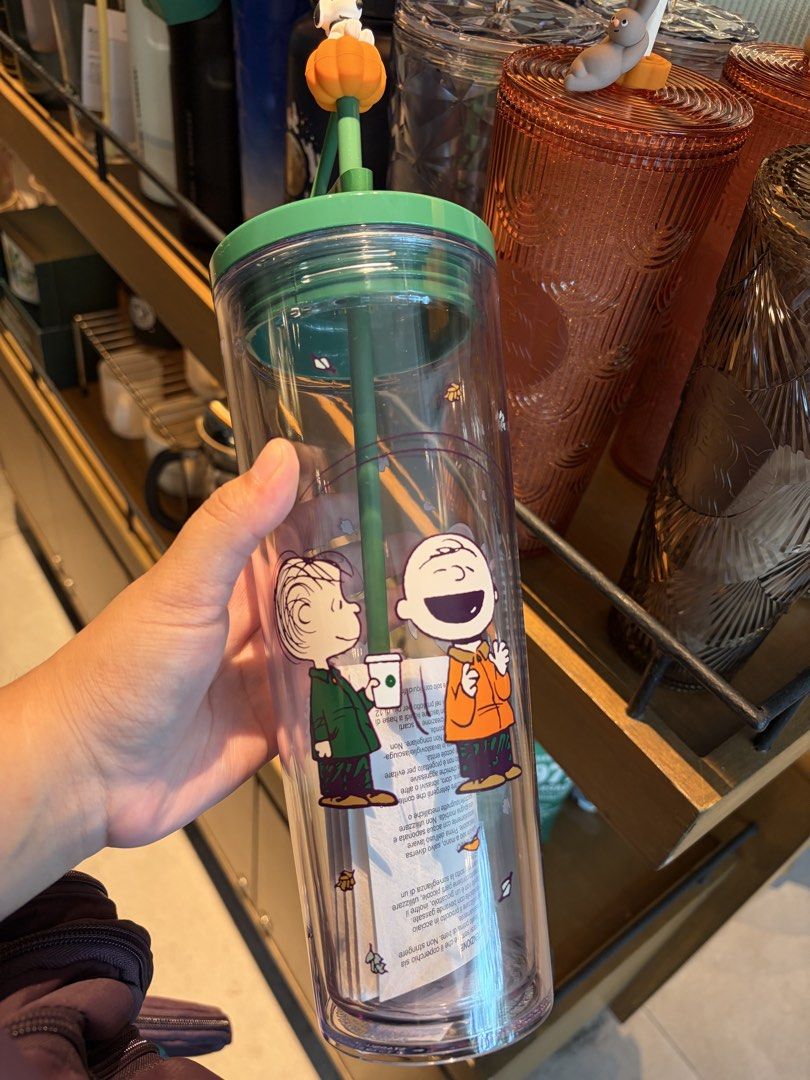 Peanuts x Starbucks (Transparent Tumbler) (Category: Water Bottles & Tumblers) located in Taguig. Submitted by its_bella (Listing ID 1462169737, Image 1). Description: ✨ Starbucks x Peanuts 🐶 Big Plush: 1,850 Transparent Tumbler: 1,625.