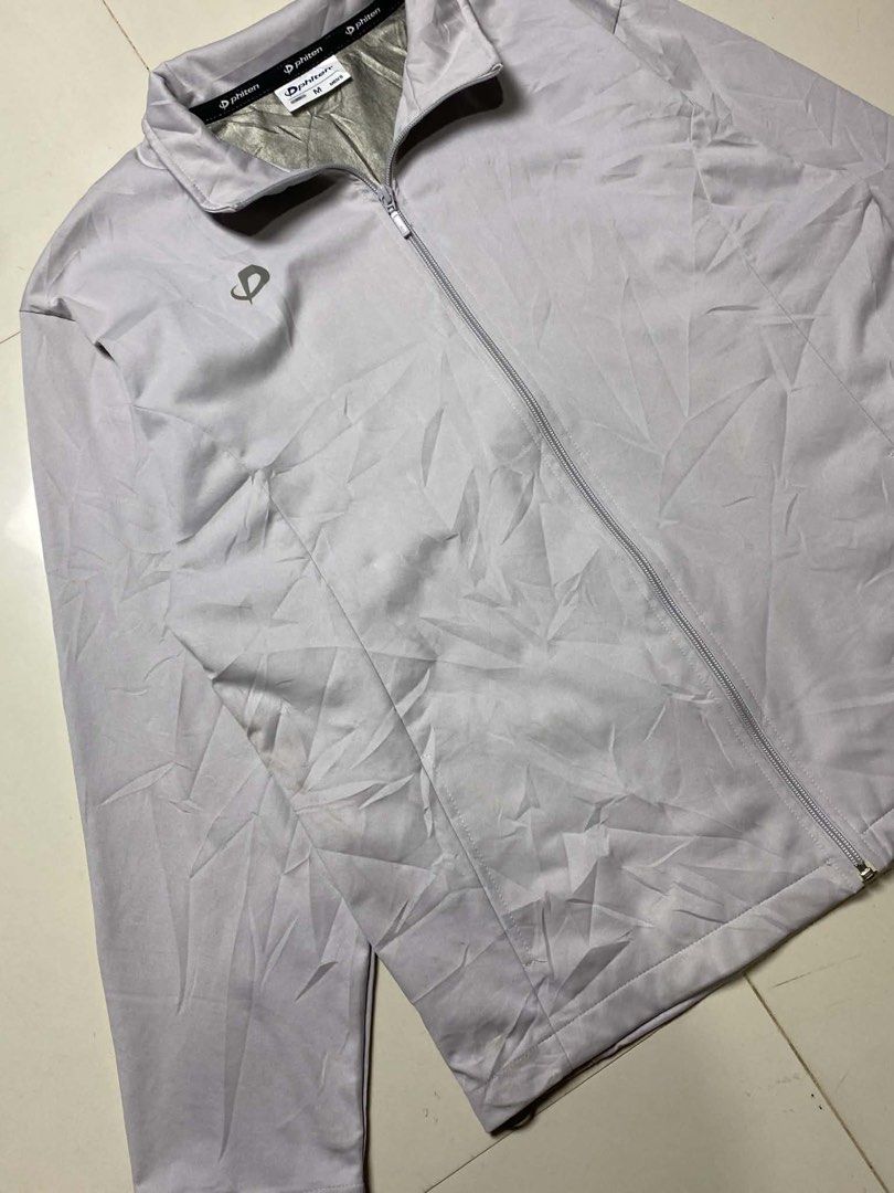 Phiten Japan Men’s Light gray Thermal Full-Zip Jacket (Category: Coats, Jackets and Outerwear) located in Tabaco. Submitted by byvinxent (Listing ID 1462099534, Image 3). Description: Phiten Japan Men’s Light gray Thermal Full-Zip Jacket Medium(Fits to large) 27 length 22.5 width Pm if interested📩📩📩.