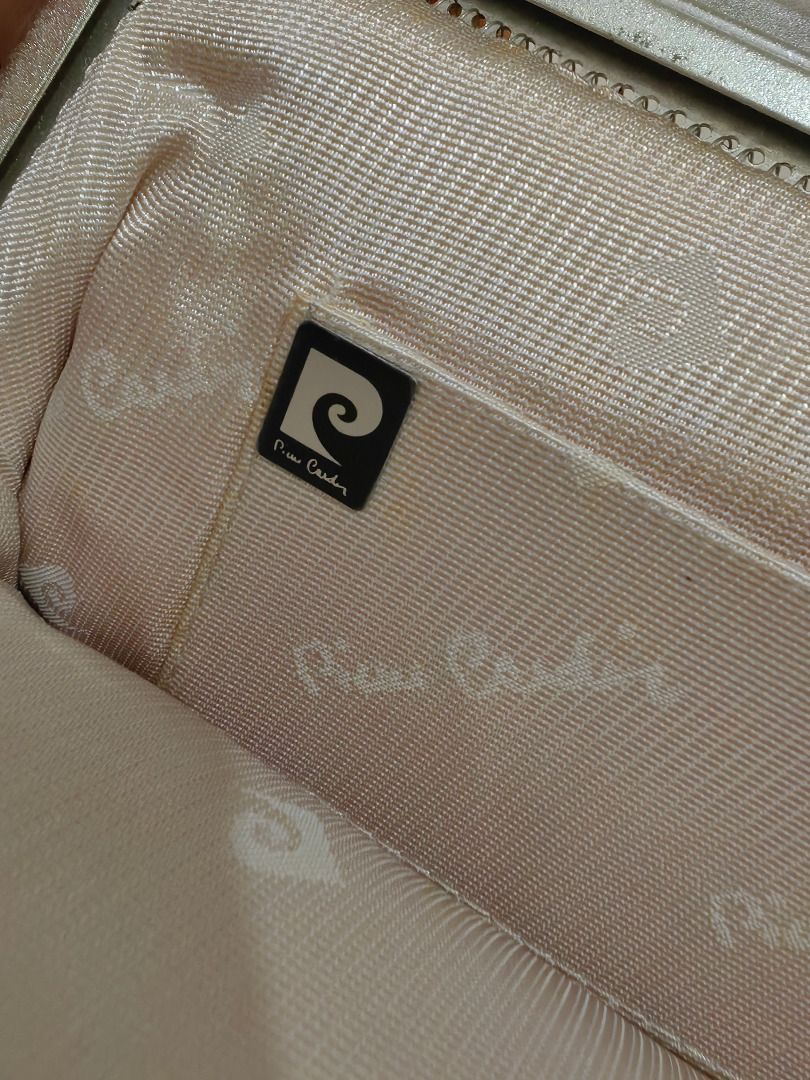 Pierre Cardin Mesh Evening Clutch Bag (Category: Clutches) located in Caloocan City. Submitted by jeremiah.curator.2026 (Listing ID 1462256481, Image 3). Description: - Vintage Pierre Cardin mesh clutch - Silver tone metal mesh - Attached chain strap - Satin-lined interior - Features Pierre Cardin logo - Ideal for parties and special occasions - A timeless accessory.