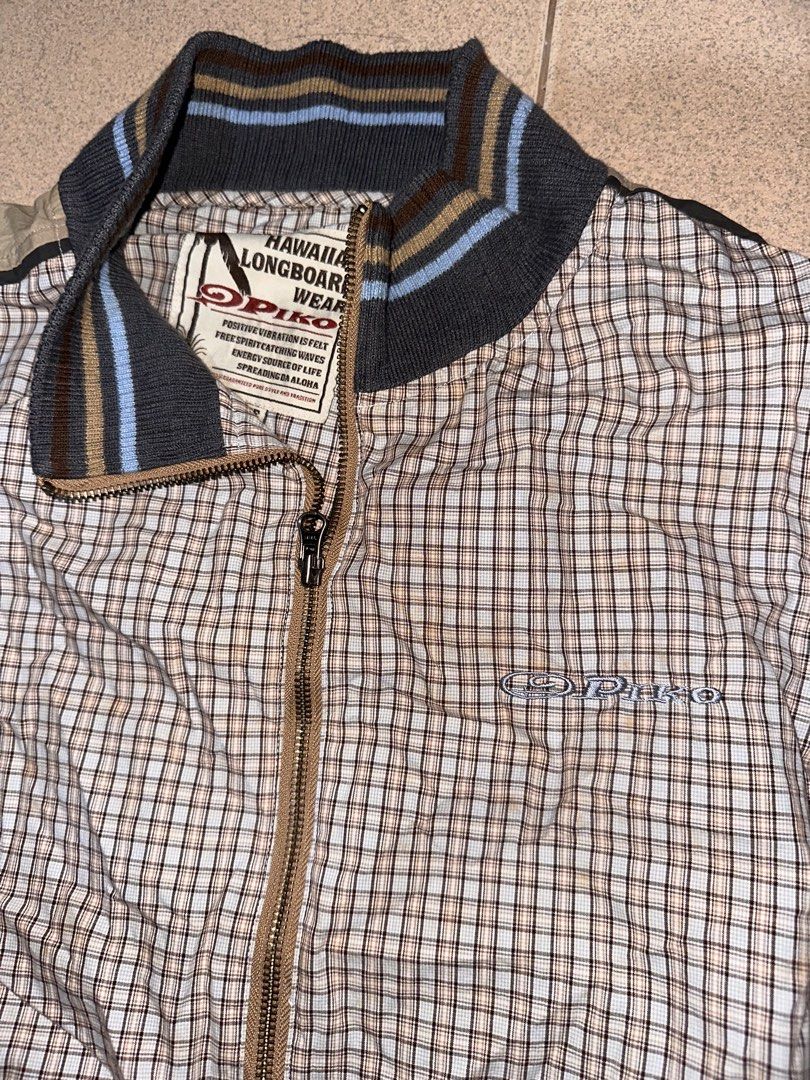 Piko Hawaii Longboard Wear (Category: Coats, Jackets and Outerwear) located in Manila. Submitted by mysticfox_80d6c7 (Listing ID 1462134166, Image 1). Description: - Piko Hawaii jacket - Classic checkered pattern - Zip-up front closure - Ribbed collar and cuffs for a comfortable fit - Two convenient side pockets - Ideal for everyday casual wear.