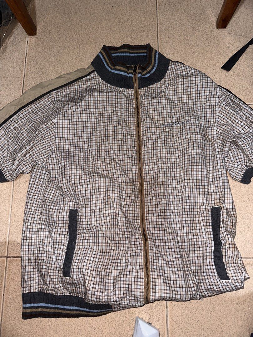 Piko Hawaii Longboard Wear (Category: Coats, Jackets and Outerwear) located in Manila. Submitted by mysticfox_80d6c7 (Listing ID 1462134166, Image 2). Description: - Piko Hawaii jacket - Classic checkered pattern - Zip-up front closure - Ribbed collar and cuffs for a comfortable fit - Two convenient side pockets - Ideal for everyday casual wear.