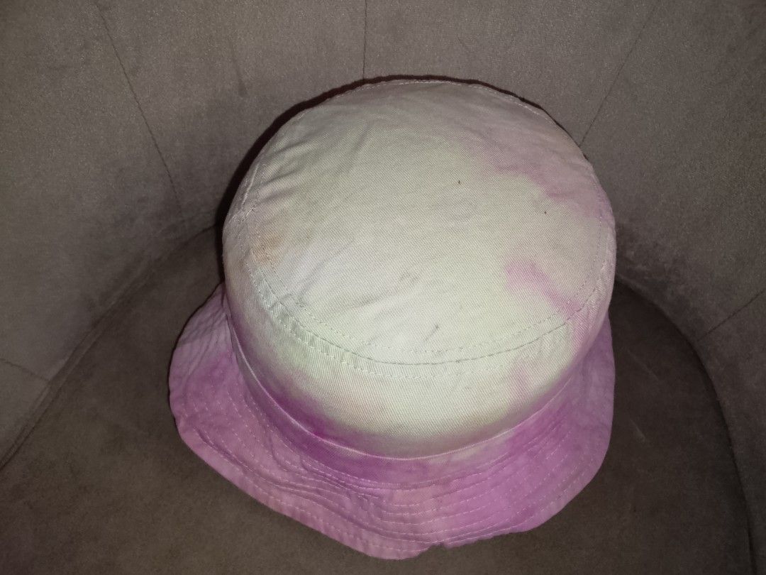 Pink & White Tie-Dye Bucket Hat (Category: Hats & Beanies) located in Binangonan. Submitted by yuristalin888 (Listing ID 1462215721, Image 3). Description: Pink & White Tie-Dye Bucket Hat Add a splash of vibrant color to your sunny-day style with this playful tie-dye bucket hat. Featuring a classic silhouette, this hat is crafted from soft, cotton-like fabric that offers comfortable, all-day wear. The unique pink and white mottled pattern ensures