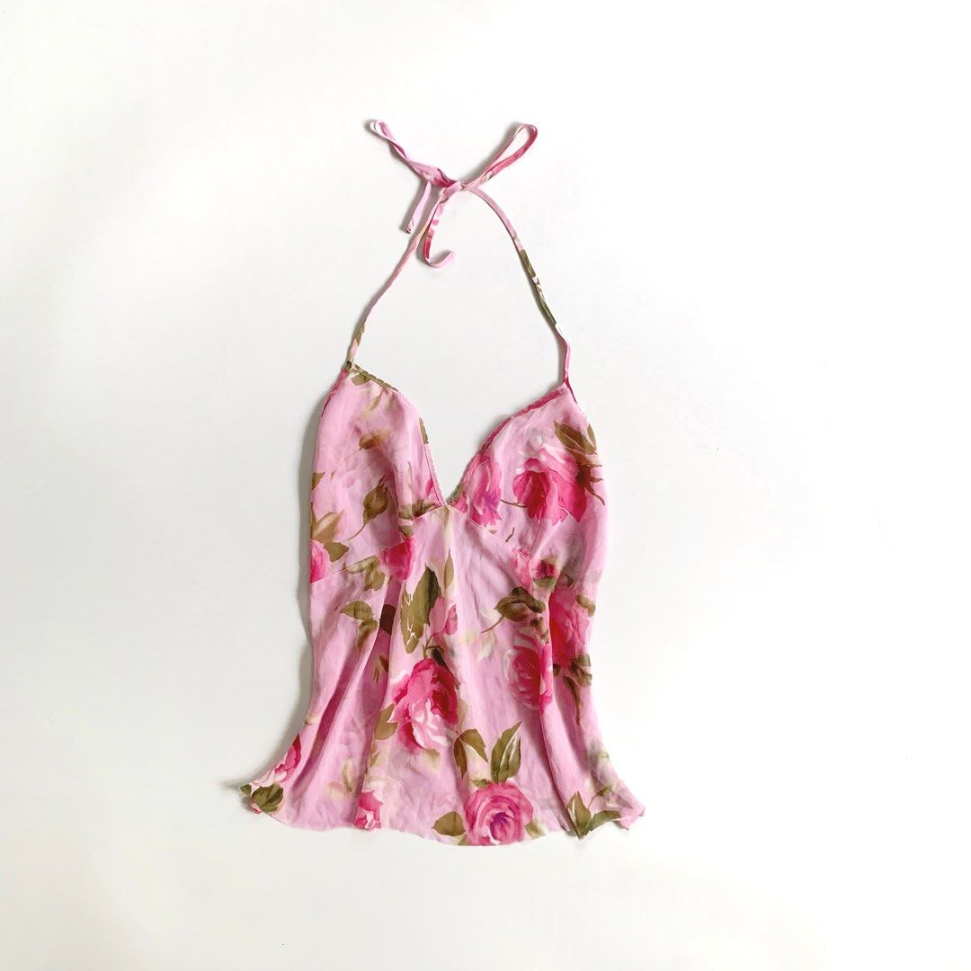 Pink Floral Halter Neck Top (Category: Sleeveless) located in Tarlac. Submitted by luv__vintage (Listing ID 1462259467, Image 2). Description: - Cute pink halter top - Vibrant floral print - V-neckline - Tie-back closure - Lightweight and flowy material - Perfect for casual or night out.