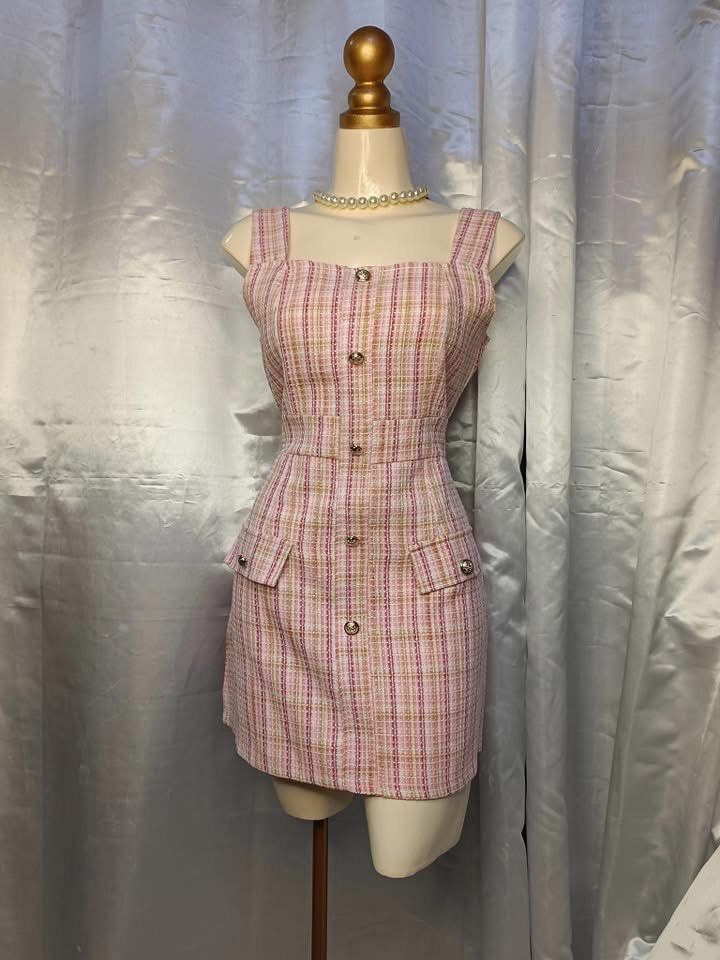 Pink Plaid Tweed Square Neck Button Front Mini Dress (Category: Dresses) located in Batangas. Submitted by nommi26 (Listing ID 1462140118, Image 1). Description: - Adorable pink plaid mini dress - Features a stylish square neckline with button front detail - design front pockets - Ideal for day outs or casual events.