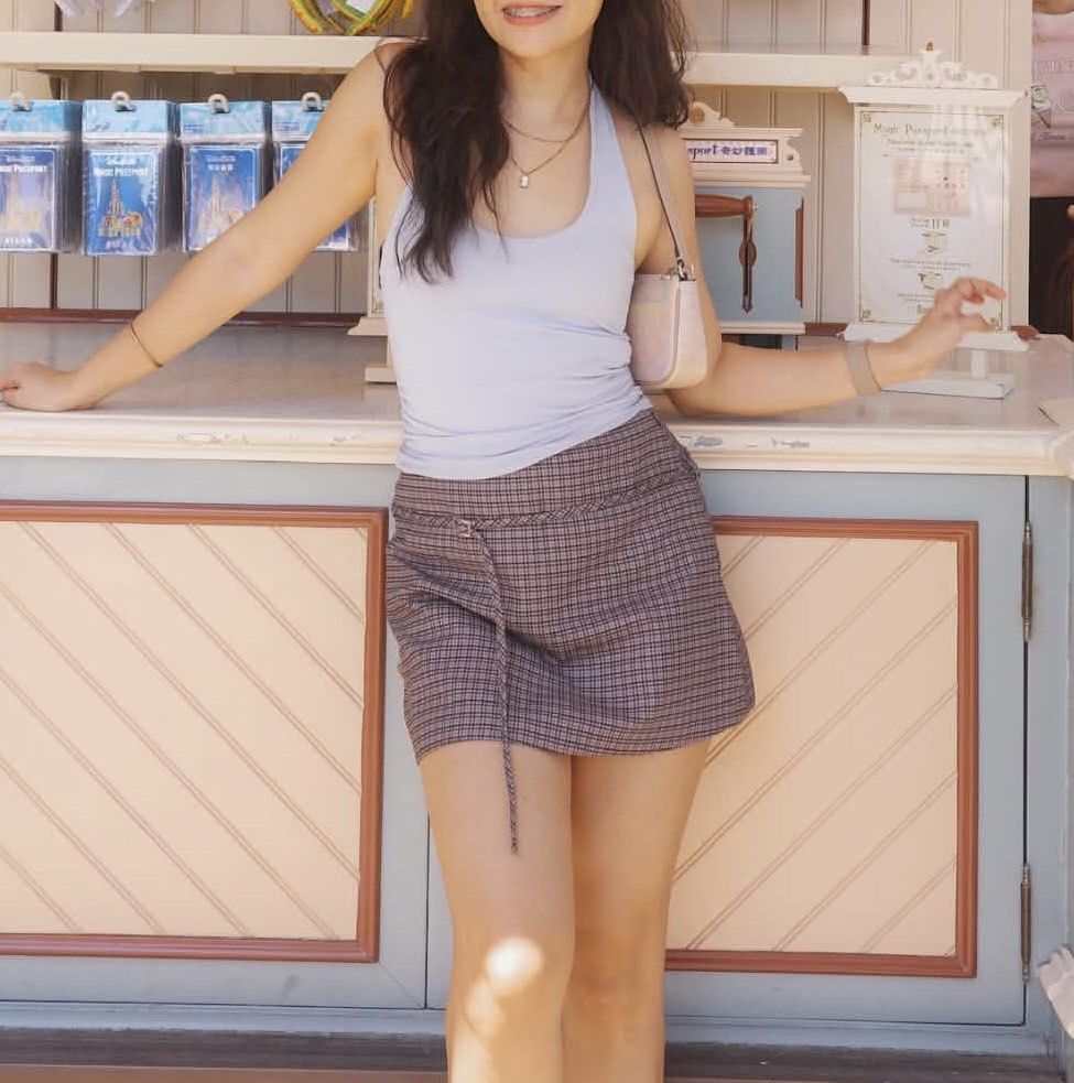 Plaid Drawstring Mini Skirt (Category: Skirts) located in Manila. Submitted by saudadeee (Listing ID 1462181041, Image 2). Description: - Brown plaid mini skirt - Ideal for casual outings or theme park trips - Easy to style with any top.