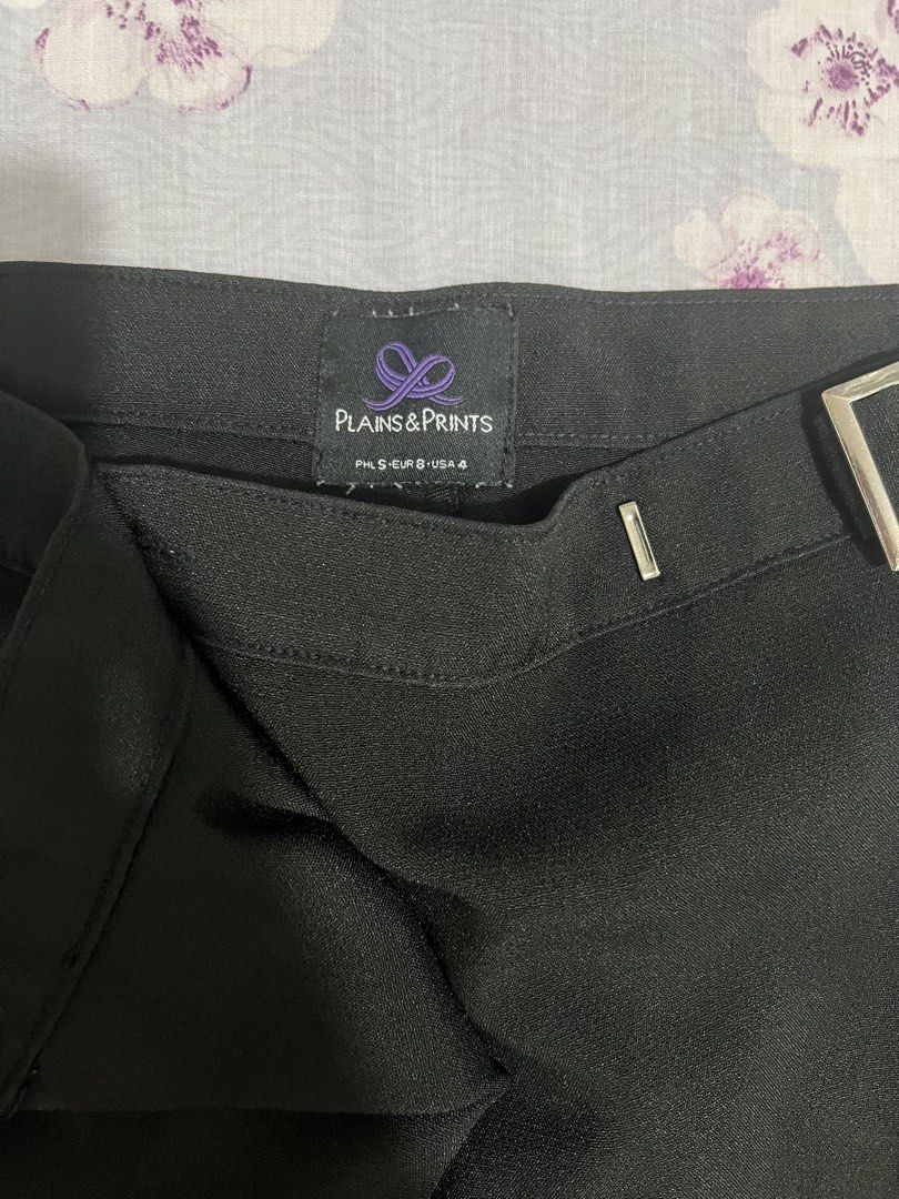 Plains & Prints Black Belted Cropped Pants (Category: Other Bottoms) located in Caloocan City. Submitted by allotherthings26 (Listing ID 1462155328, Image 3). Description: - Brand: Plains & Prints - Color: Black - Style: Cropped pants - Features: Cuffed hem, matching belt with silver buckle, unique wrap-around waist detail - Occasion: Smart casual, office wear - Size: S (PHL) / 8 (EUR) / 4 (USA).